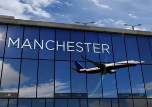 Manchester Airport glass facade with airplane and logo – Manchester Airport Taxi transfers