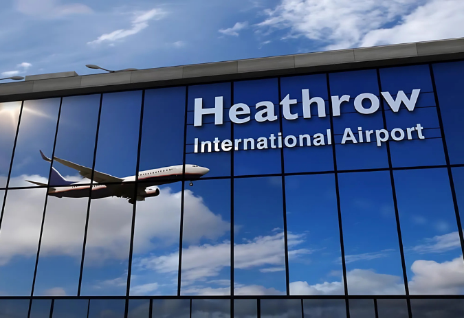 Heathrow Airport exterior glass facade with plane – Getwick Airport Taxi transfers
